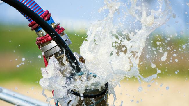 A Tatura dairy farmer said he was in financial difficulty when he illegally pumped water from an irrigation channel.