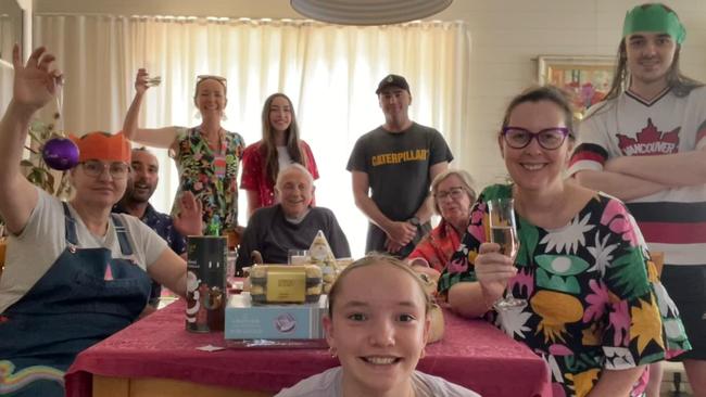 Ross Lane (back centre) died suddenly after Christmas Day lunch. Eldest daughter Kristy Lane is seated at the right.