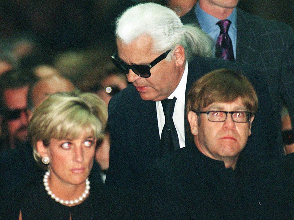 Diana, Princess of Wales, German fashion designer Karl Lagerfeld and British pop-star Elton John, attend the memorial mass for Gianni Versace in 1997.  Picture:  AP