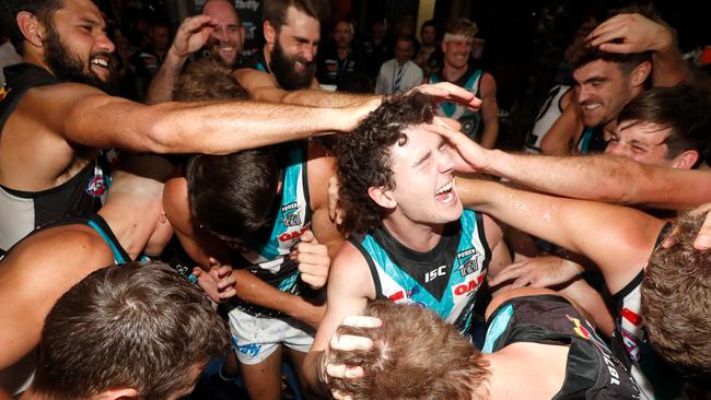 Darcy Byrne-Jones and his Power teammates celebrate their win in Shanghai. Picture: Michael Willson/AFL Photos