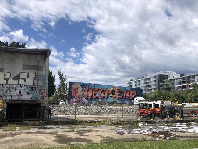 Fire crews in attendance at a suspicious fire under a building on Hockings St, South Brisbane. Picture: Shaye Windsor