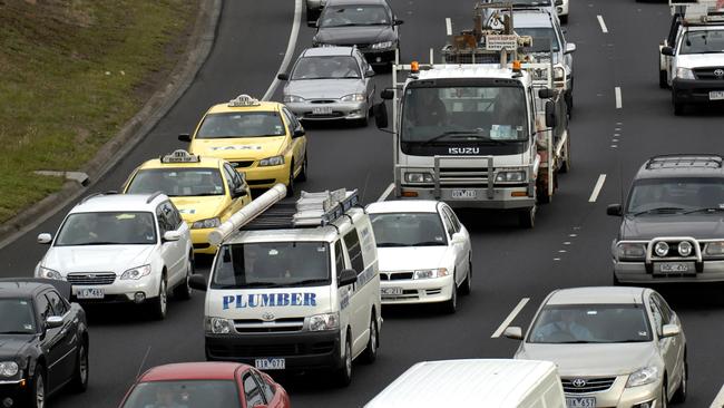 Traffic banks up during morning peak hour on the Tullamarine Freeway near the Essendon Airport.