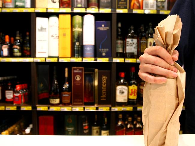 Generic photos of liquor bottle shop, alcohol, brown paper bag, wine, beer, spirit, spirits, grog shop.