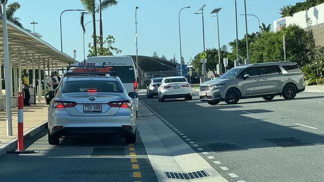 A car performs an illegal U-turn at the new taxi rank at Gold Coast Airport. Picture: Supplied