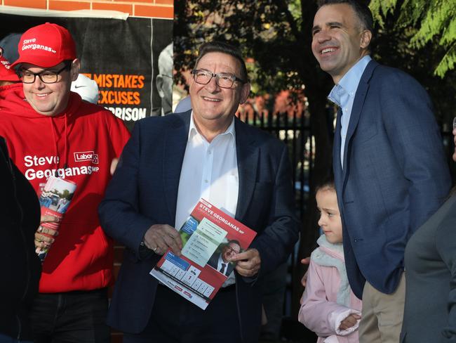 Steve Georganas supported by Premier Peter Malinauskas, who arrived with daughter, Sophie to join the voting lineup. 21 May 2022. Picture Dean Martin