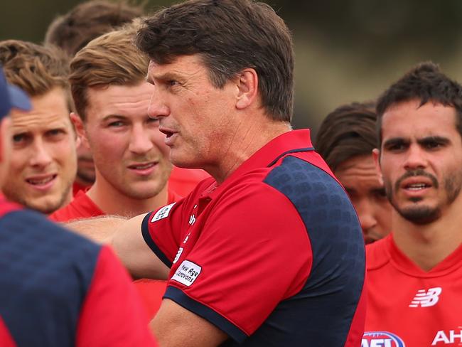 Paul Roos speaks to his players during Melbourne’s NAB Challenge win over the Western Bulldogs in Ballarat. Photo by Quinn Rooney.