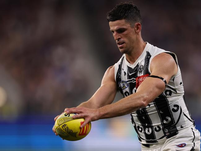 Scott Pendlebury of the Magpies in action, Photo by Paul Kane/Getty Images.