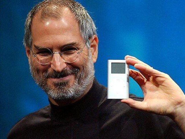 Steve Jobs in his heyday unveiling an iPod.