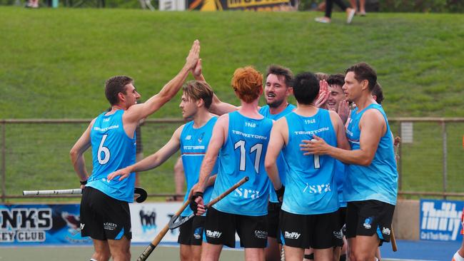 The Territory Stingers celebrating during the Festival of Hockey.