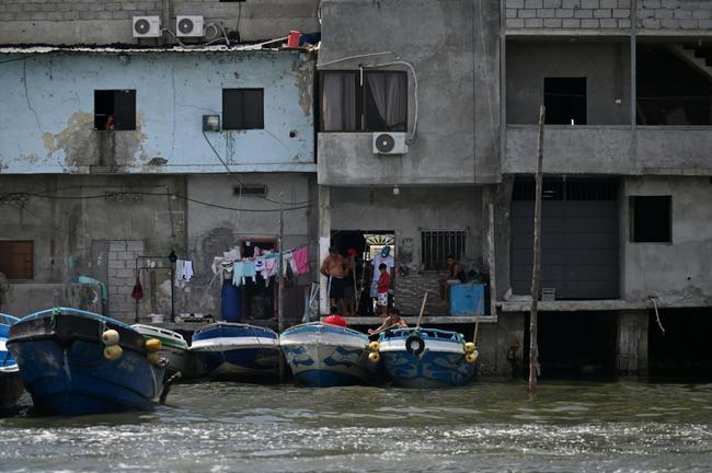 Boats and artisanal docks are seen in the Huayala Estuary, in El Oro province, Ecuador