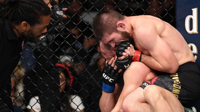 Khabib Nurmagomedov of Russia submits Conor McGregor