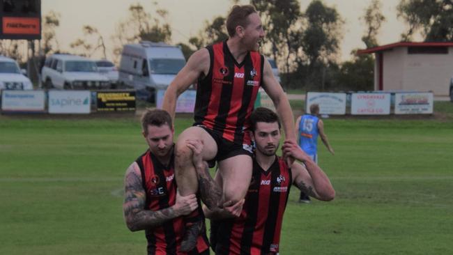 Jervois Football Club legend Ty ‘Buckets’ Burkett is chaired off by teammates after the game on Saturday. Picture: Ty Burkett