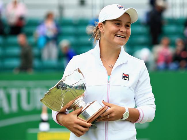 NOTTINGHAM, ENGLAND - JUNE 17:  Ashleigh Barty of Australia celebrates victory in the Womens Singles Final during Day Nine of the Nature Valley Open at Nottingham Tennis Centre on June 17, 2018 in Nottingham, United Kingdom.  (Photo by Ben Hoskins/Getty Images for LTA)