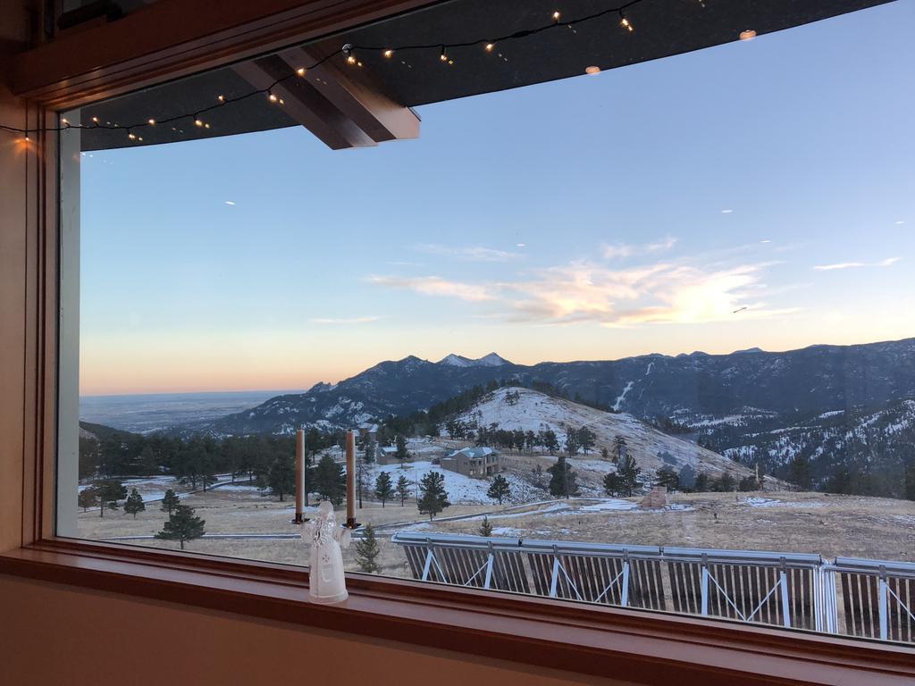 During her travels, she stayed in a home in Boulder with this view from the dining room. Picture: Supplied / Madolline Gourley