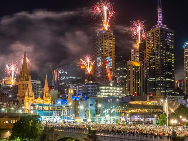 Fireworks erupt over the Melbourne central business district during New Year's Eve celebrations in Melbourne. Picture: Getty