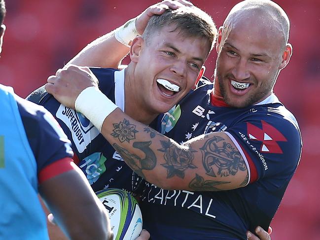 NEWCASTLE, AUSTRALIA - SEPTEMBER 05: Tom Pincus of the Rebels   celebrates with Bill Meakes of the Rebels after scoring a try during the round 10 Super Rugby AU match between the Melbourne Rebels and the Western Force at McDonald Jones Stadium on September 05, 2020 in Newcastle, Australia. (Photo by Jason McCawley/Getty Images)