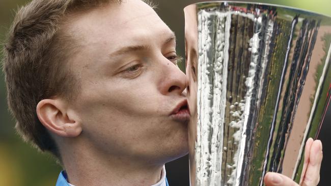 Michael Dee gives the Derby trophy a kiss. Picture: Darrian Traynor-Getty Images