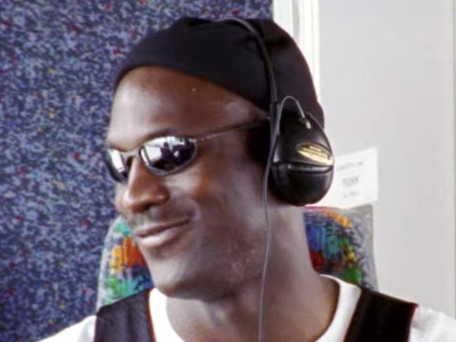 Michael Jordan jamming along to Kenny Lattimore