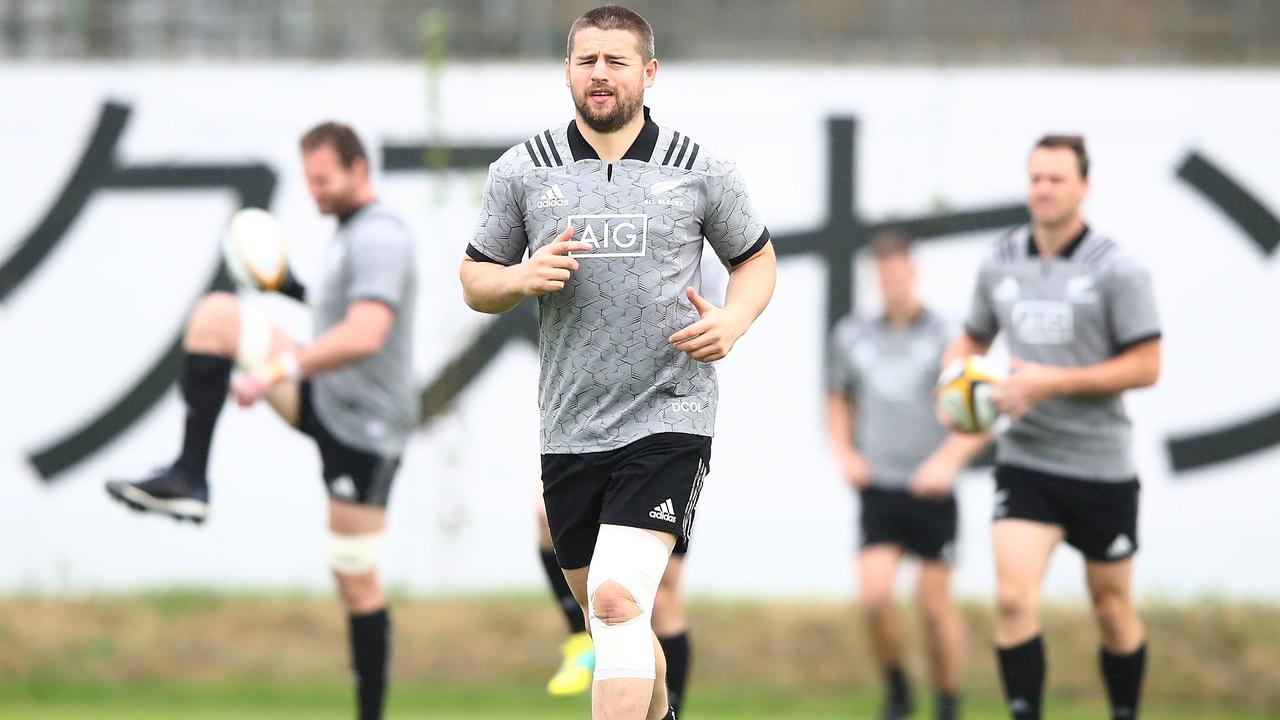 Dane Coles warms up during an All Blacks training session in Tokyo.