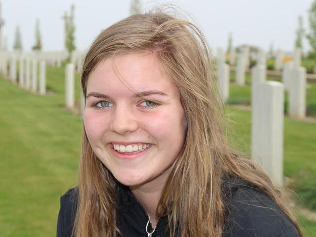 Megan Cridland visits the headstone of a relative ahead of Anzac Day. Picture: Charles Miranda