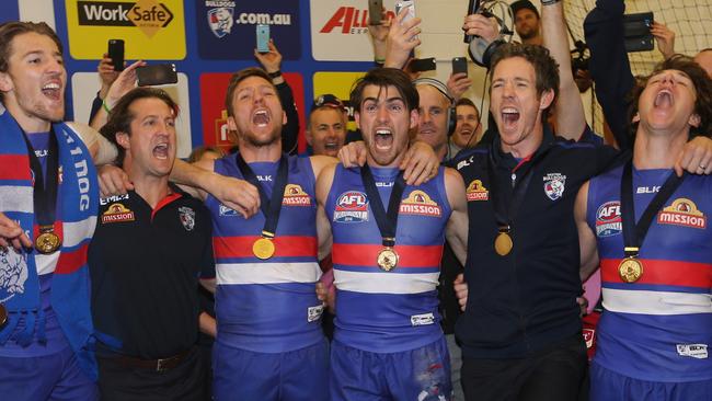Luke Beveridge and his players sing the Bulldogs song loud and proud. Picture: Wayne Ludbey