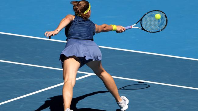 Czech Republic's Karolina Muchova hits a return against Australia's Ashleigh Barty