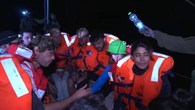 Greta Thunberg (green hat) in a video posted from aboard the yacht Madleen. Picture: X