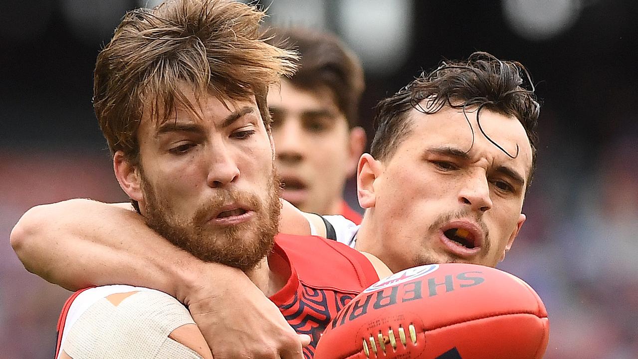 Jack Viney of the Demons (left) and Sam Powell-Pepper of the Power. Picture: AAP Image/Julian Smith