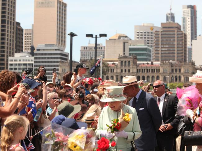 Queen Elizabeth II and Prince Philip the Duke of Edinburgh meet with members of the public that gathered during her visit to Brisbane in 2011.