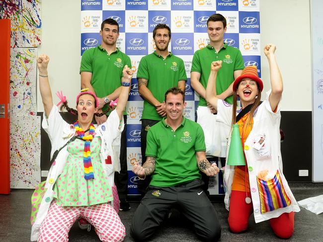 Luke Wilkshire (bottom, centre) brought some joy to Sydney Children’s Hospital. Picture: John Appleyard.