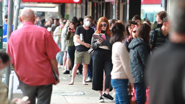 Queues outside Centrelink in March, when the coronavirus crisis first swept the country. Picture: John Feder.