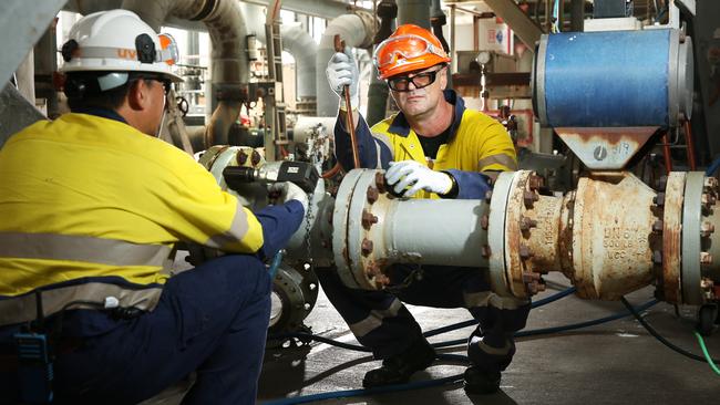 Plant workers at the Qenos Gas plant in Botany back in 2018. Picture: Richard Dobson