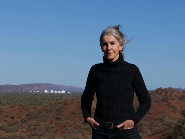 Kieran Finnane with Pine Gap facilities in the background