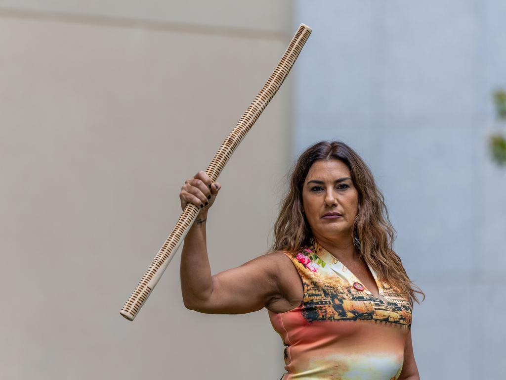 Former Greens senator Lidia Thorpe carried a message stick with engravings that she said represented hundreds of deaths in custody since she began in federal parliament. Picture: NCA NewsWire / Gary Ramage