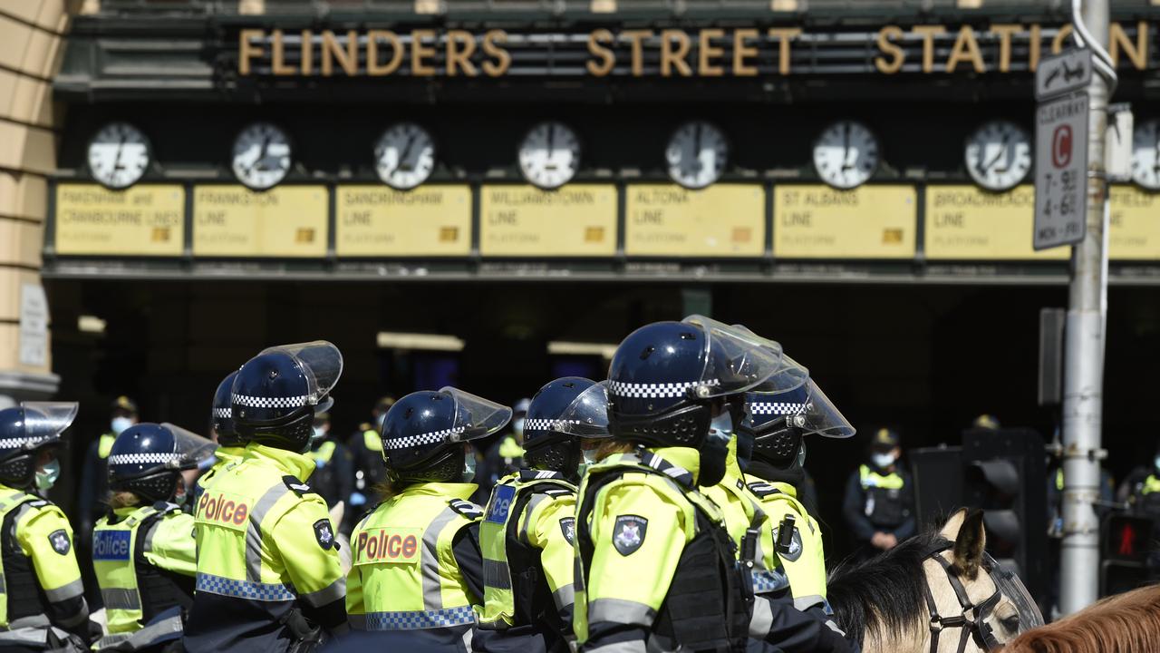 Police outside Flinders Street Station in Melbourne. Picture: NCA NewsWire / Andrew Henshaw