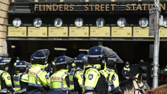 Police outside Flinders Street Station in Melbourne. Picture: NCA NewsWire / Andrew Henshaw