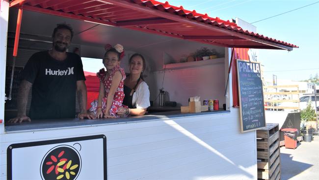 Mark Tutor, Esti Rey and Willow converted an old caravan into a food van for their new business on the Capricorn Coast, Paella Fiesta.