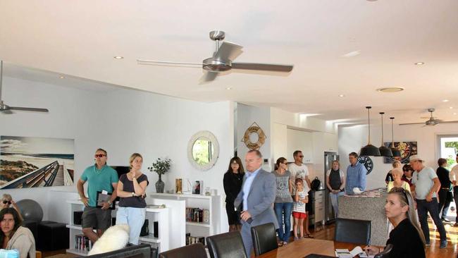 Belle Property Noosa's John Stamp and Ben Radcliffe work towards a sale under the hammer for 300 David Low Way.