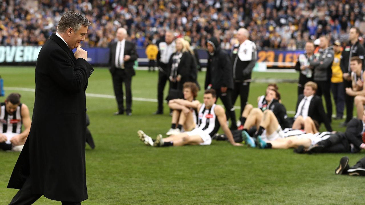 McGuire walks past his players following the 2018 Grand Final loss.