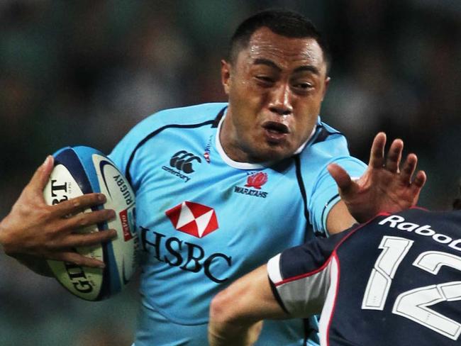 Waratahs Sekope Kepu fends off James O'Connor during NSW Waratahs v Melbourne Rebels Super 15 Rugby at Allianz Stadium in Sydney.