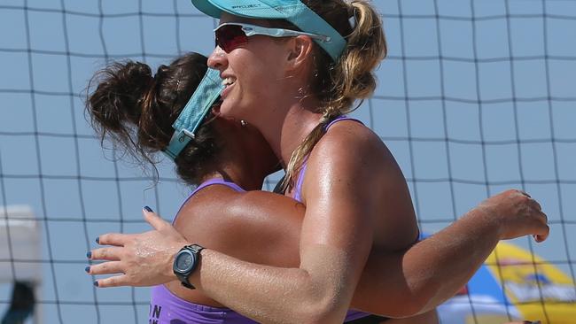 Mariafe Artacho Del Solar (left) (AUS/NSW) and team mate Nikki Laird (AUS/SA) celebrate at the Australian Beach Volleyball Championship, Surfers Paradise, Gold Coast. Picture: Regi Varghese