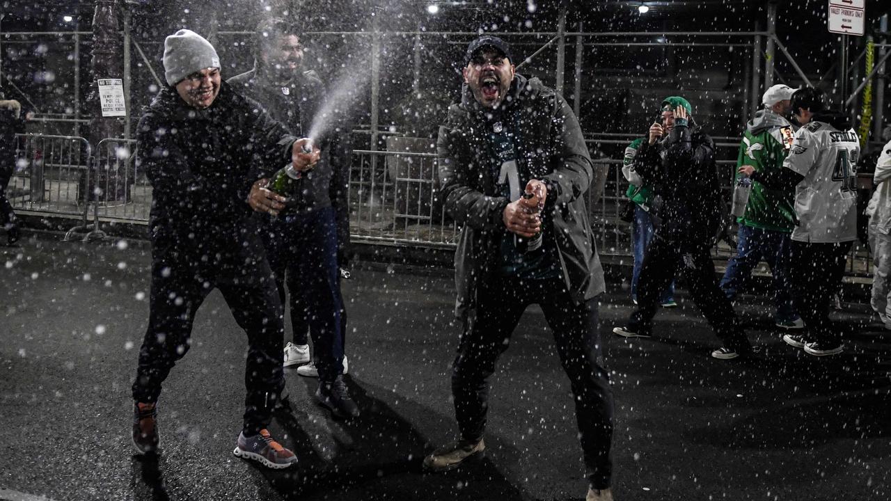 Champagne and beer was sprayed all over the city after the Eagles defeated the Chiefs to win the Super Bowl. Matthew Hatcher/Getty Images/AFP