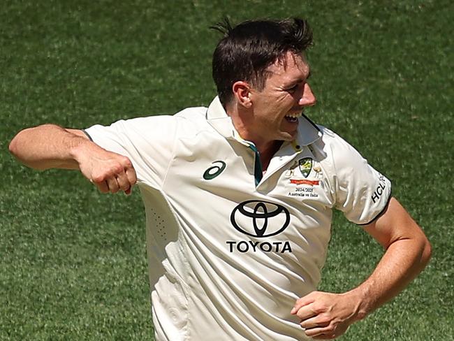 PERTH, AUSTRALIA - NOVEMBER 24: Pat Cummins of Australia celebrates taking the wicket of Dhruv Jurel of India for 1 run during day three of the First Test match in the series between Australia and India at Perth Stadium on November 24, 2024 in Perth, Australia. (Photo by Robert Cianflone/Getty Images)