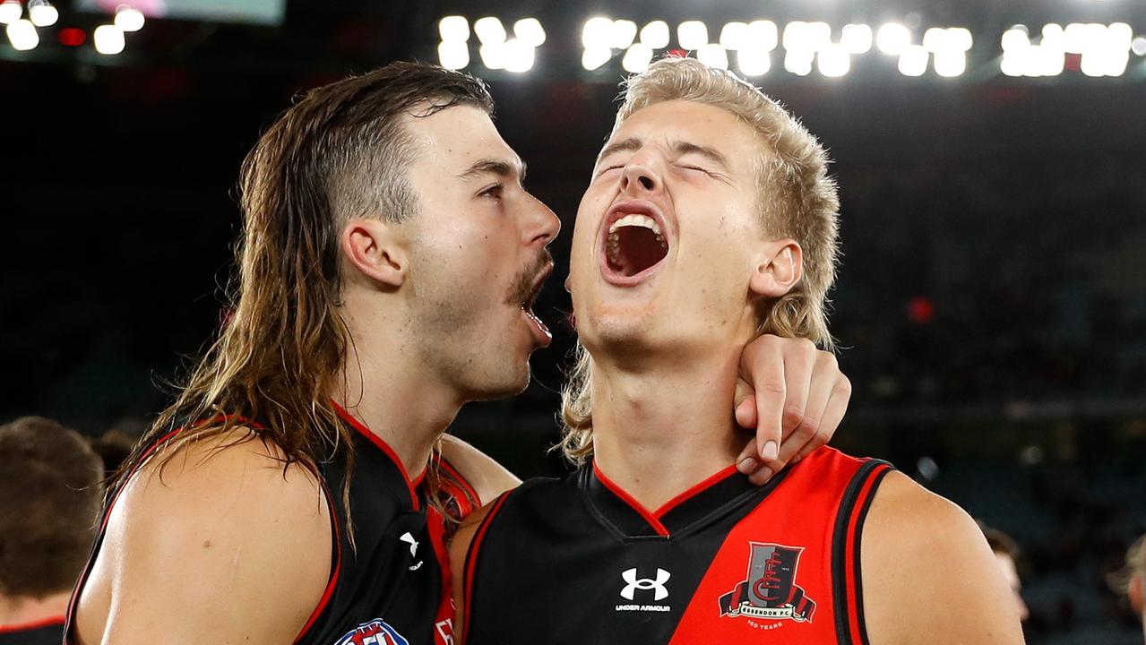 Sam Draper and Nick Bryan show the joy of winning after beating Hawthorn on Saturday night. Picture: Getty Images