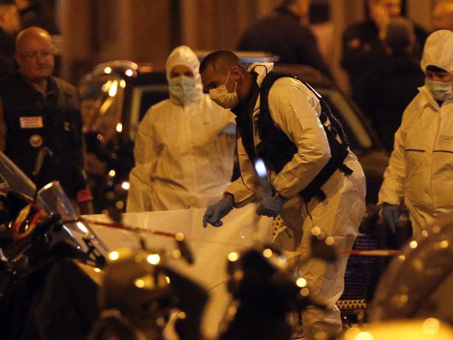 Police investigate the scene in a busy section of Paris where a knife-wielding man killed one person and injured others. Pictue: AP/Thibault Camus