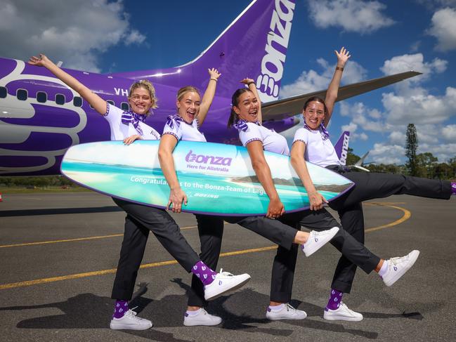 Bonza Flight attendants Jasmin Elliott  Jade Lankester Justis Adams and  Emma McBreen at Sunshine Coast Airport pic Peter Wallis