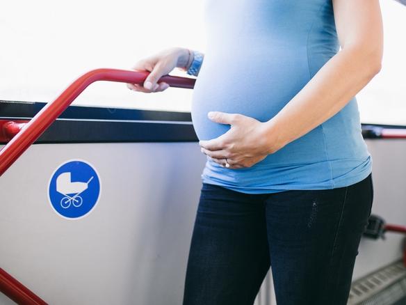 RendezView. Beautiful young pregnant woman in city bus. (Pic: iStock)