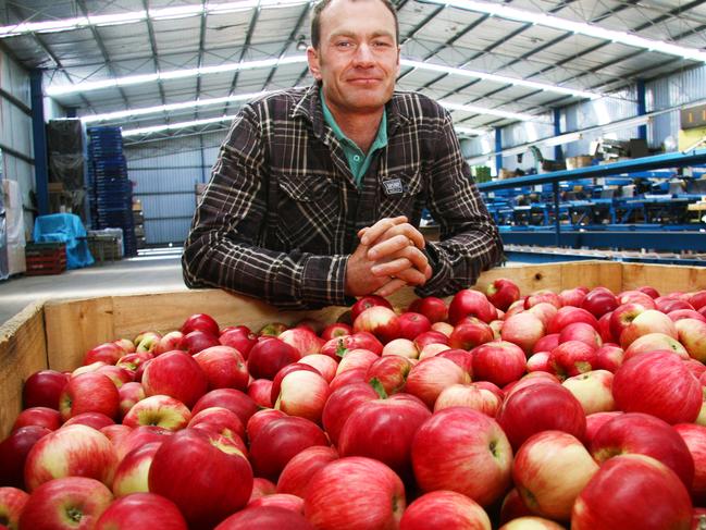 Orchardist Justin Miller with some of this season's new apples.