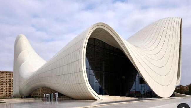 Clad in reinforced concrete and polyester, the 619,000-square-foot Heydar Aliyev Centre in Baku, Azerbaijan, is known for its swooping façade. Architect: Zaha Hadid