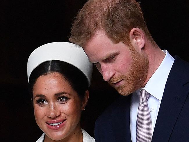 (FILES) In this file photo taken on March 11, 2019 Britain's Prince Harry, Duke of Sussex (R) and Meghan, Duchess of Sussex leave after attending a Commonwealth Day Service at Westminster Abbey in central London. - Britain's royal family on Sunday braced for further revelations from Prince Harry and his American wife, Meghan, as a week of transatlantic claim and counter-claim reaches a climax with the broadcast of their interview with Oprah Winfrey. (Photo by Ben STANSALL / AFP)